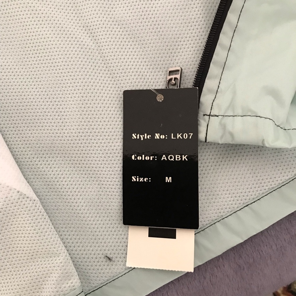 Aqua colored windbreaker for women - Picture 4 of 8